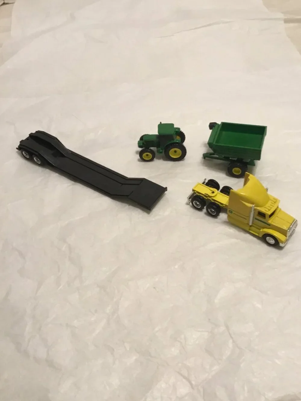 Vintage die cast John Deere tractor trailer and trailer w/ tractor and grain bin